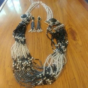 Long black and white necklace with earrings